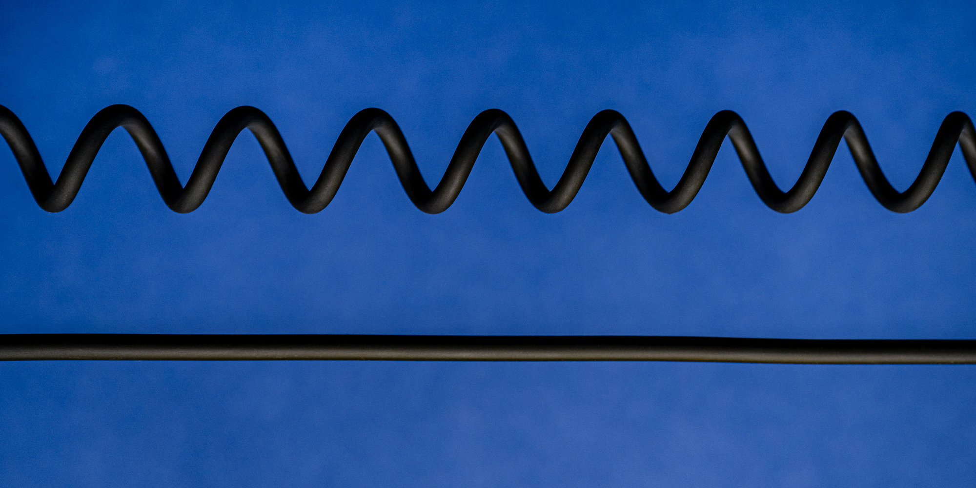 Kabel Newell USB-C - USB-C 100 W, 1,5 m, silikonowy, spiralny, czarny